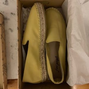 Beautiful never worn yellow leather espadrilles.